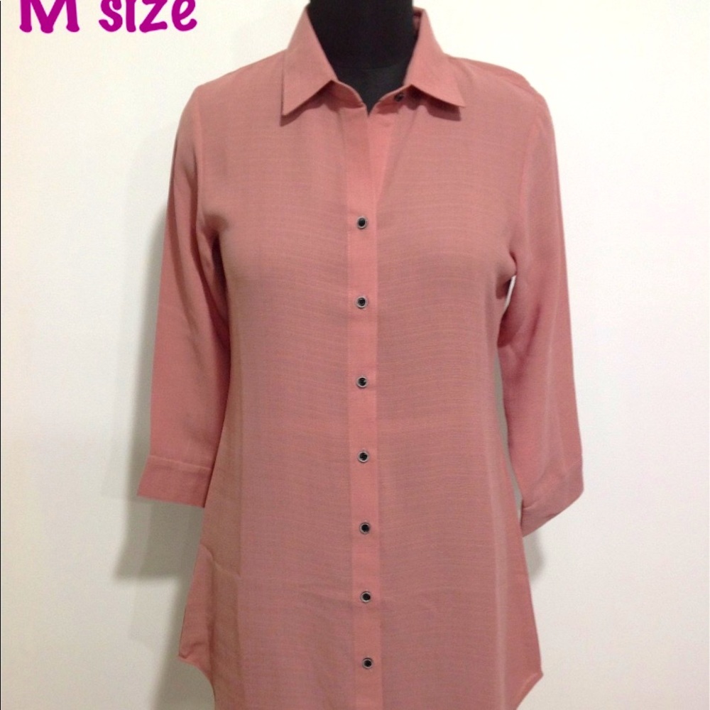 Tunic in asymmetric from bottom